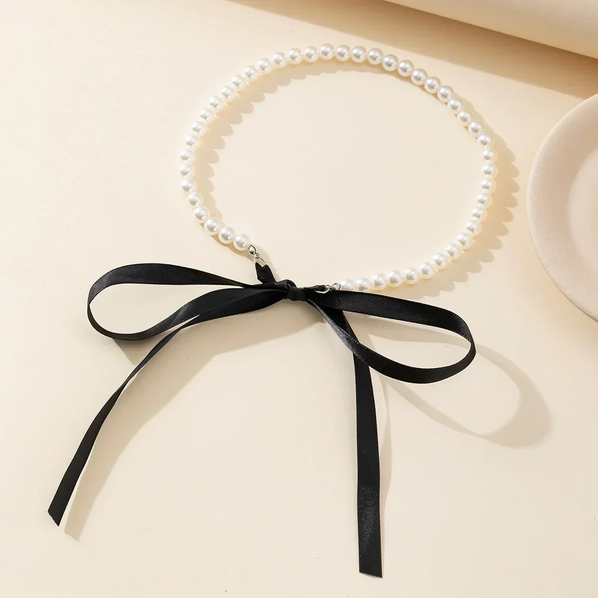 Perełkowy choker z kokardką - Image 3